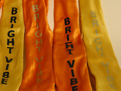 Ties (Orange and yellow tie) (Black or silver writing) main photo