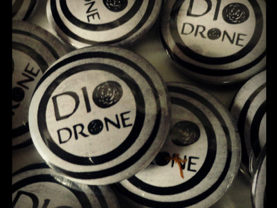 Dio)))Drone button main photo
