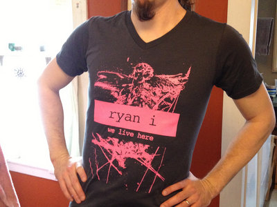 "we live here" t-shirt: pink frank main photo