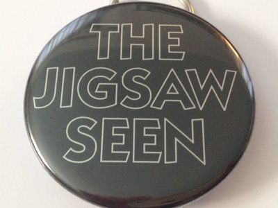 "The Jigsaw Seen" keychain bottle opener main photo