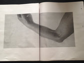 Newsprint Booklet for "bones you have thrown me and blood I've spilled" including lyrics and artwork photo 