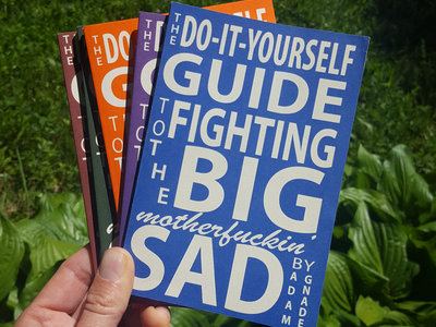 The Do-It-Yourself Guide to Fighting the Big Motherfuckin' Sad paperback book main photo