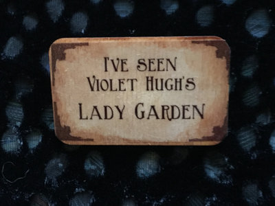 “I’ve Seen Violet Hugh’s Lady Garden” Wooden Badge main photo