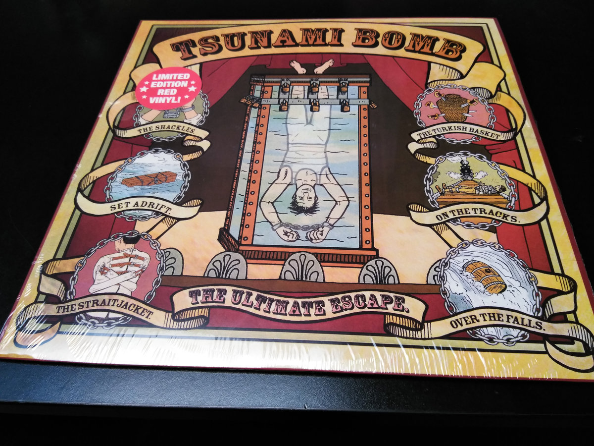洋楽 Tsunami Bomb - The Ultimate Escape PICLP Tsunami Bomb - The Ultimate Escape (Gold Vinyl) - Cleopatra