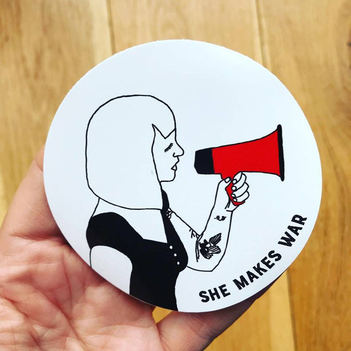 Megaphone sticker She Makes War