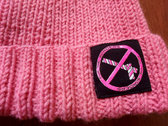 Hand-knitted beanie with "Fuk the borders" print. photo 