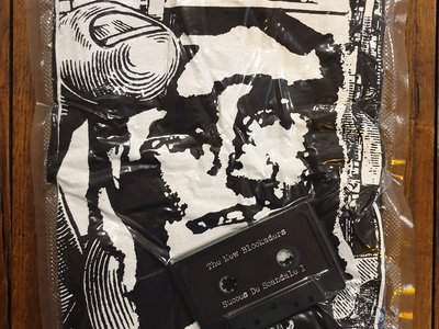 The New Blockaders 'Succes De Scandale' Cassette and T-shirt vacuum pack main photo