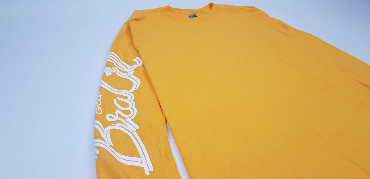 golden yellow long sleeve shirt