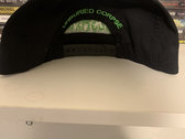 Green embroidered snapback hat photo 
