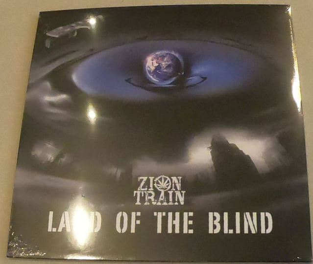 Land Of The Blind | Zion Train