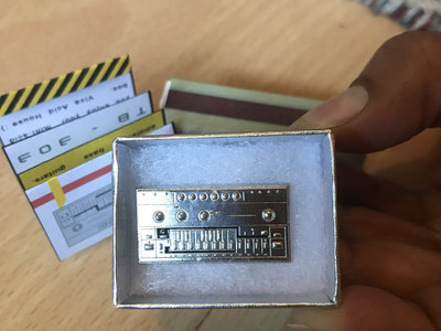 Tiny 303. TB-303 scale model metal pin badge. main photo