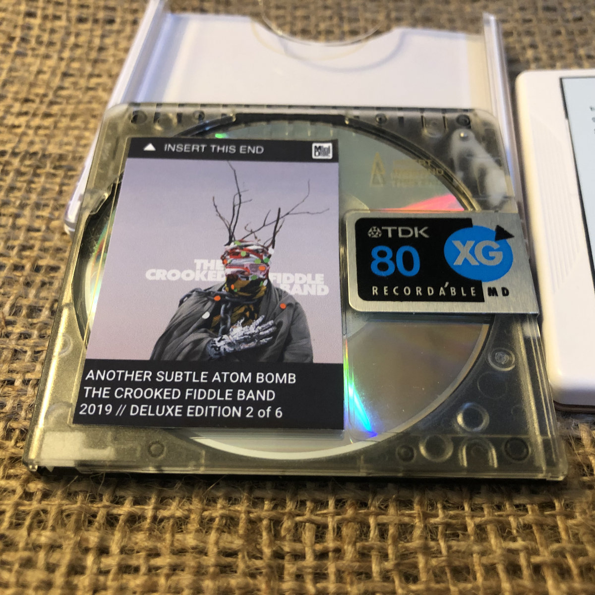 Limited Edition MiniDisc w/ album download and bonus tracks