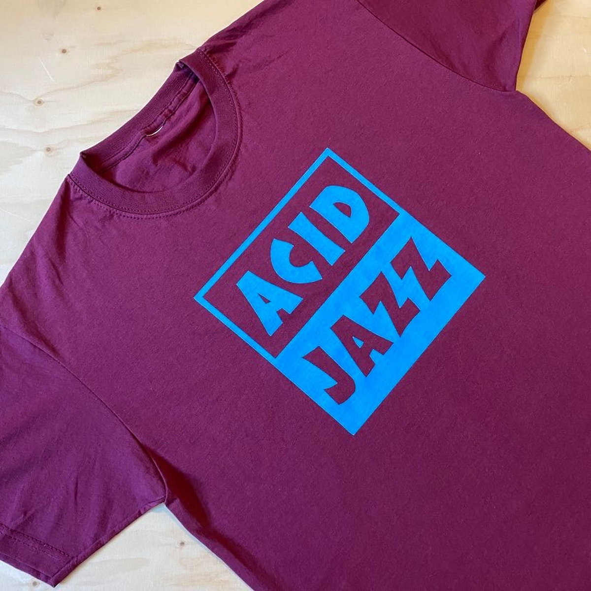 Acid Jazz Logo T-shirt (Burgundy and Light Blue) | Acid Jazz Records