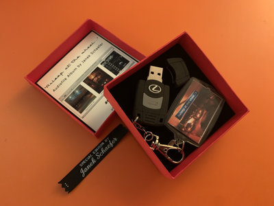 Boxed limited edition USB car keyring album main photo