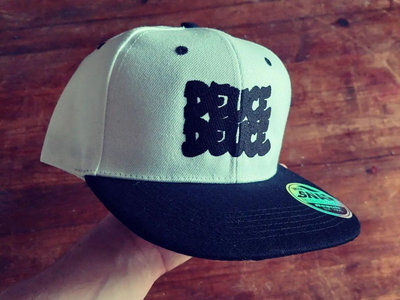 Embroidered snap back cap main photo