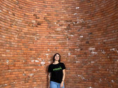 Woman black t-shirt with green Excedo Records Logo photo 
