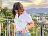 Woman white t-shirt with green Excedo Records Logo photo 