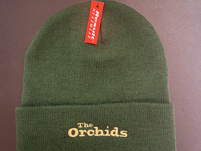 Green beanie hat with gold lettering main photo