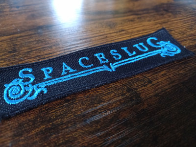 SPACESLUG Blue Patch Logo main photo