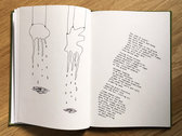 hardcover book of lyrics and drawings photo 