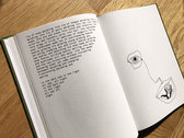 hardcover book of lyrics and drawings photo 