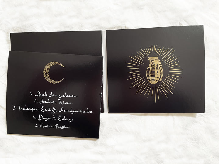 Lalique Gadaffi Handgrenade | Muslimgauze