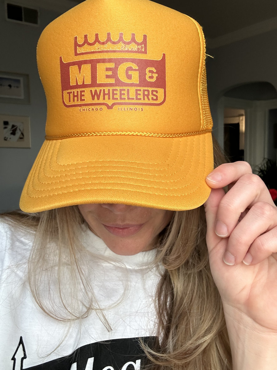 Meg Testing Hat Meg and the Wheelers Trucker Hat-Gold/Yellow | Meg and the Wheelers