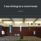 i am sitting in a courtroom thumbnail