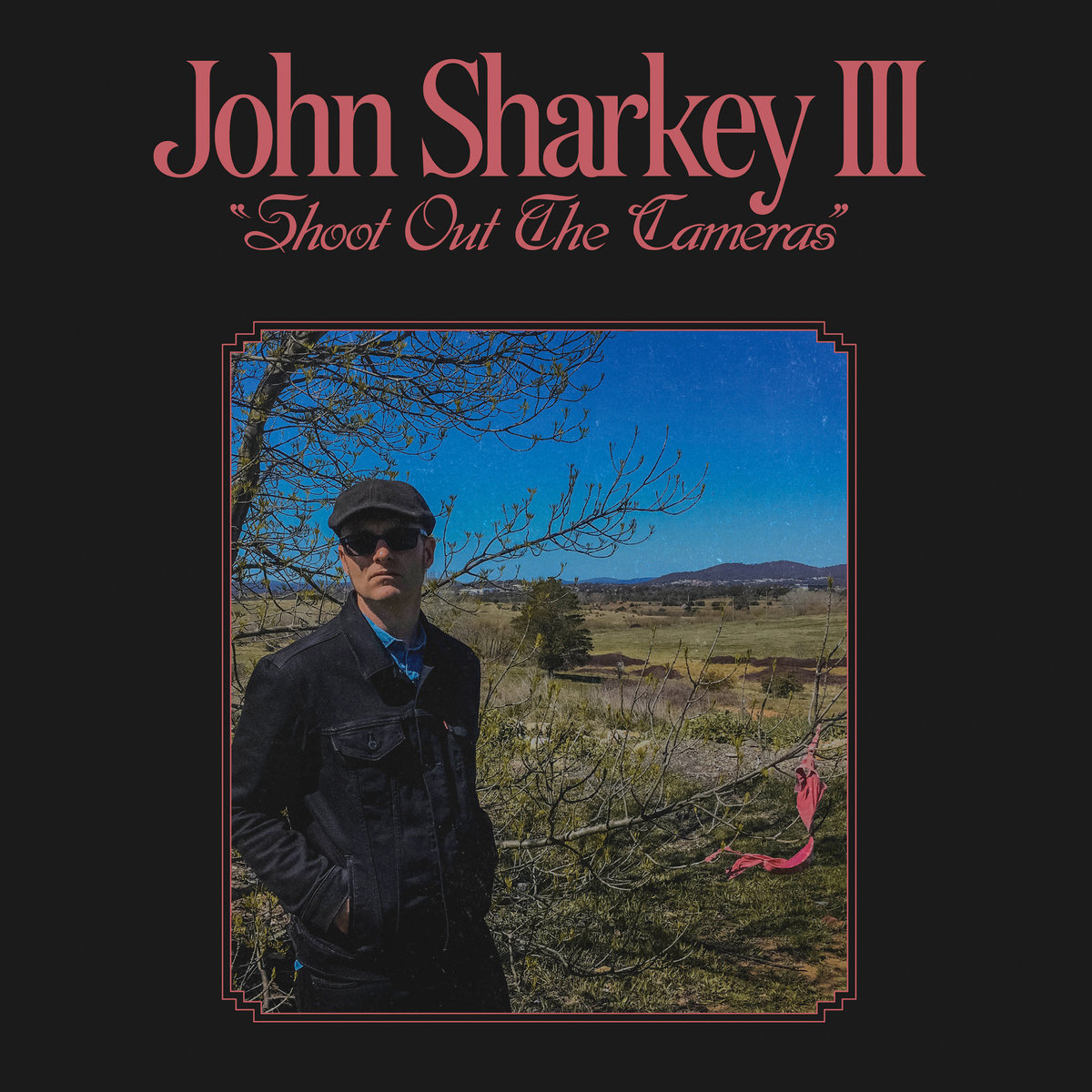John Sharkey III – Shoot out the cameras