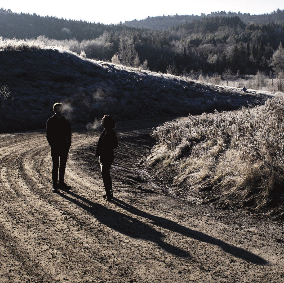 Two People Walking Away From Each Other