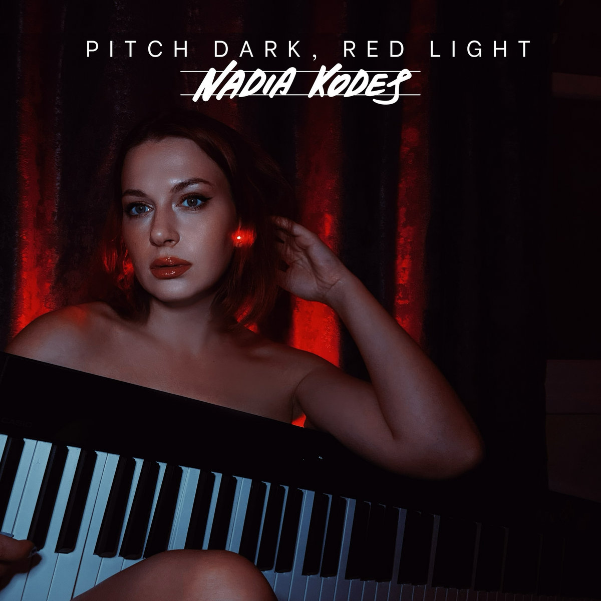 Pitch Dark, Red Light | Nadia Kodes