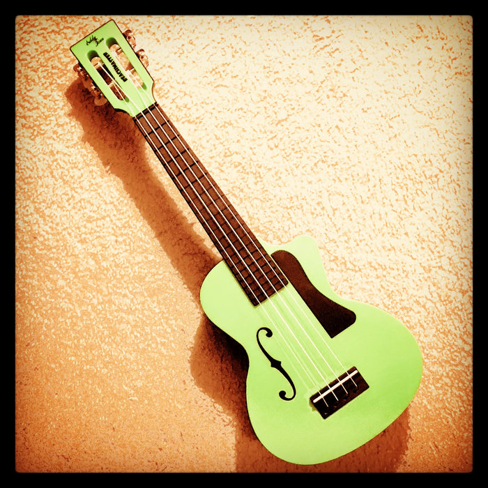 Green Plastic Ukulele A Couple Of Ukes