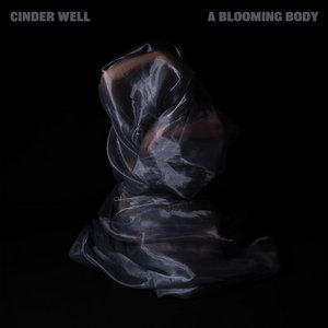 Cinder Well — A Blooming Body