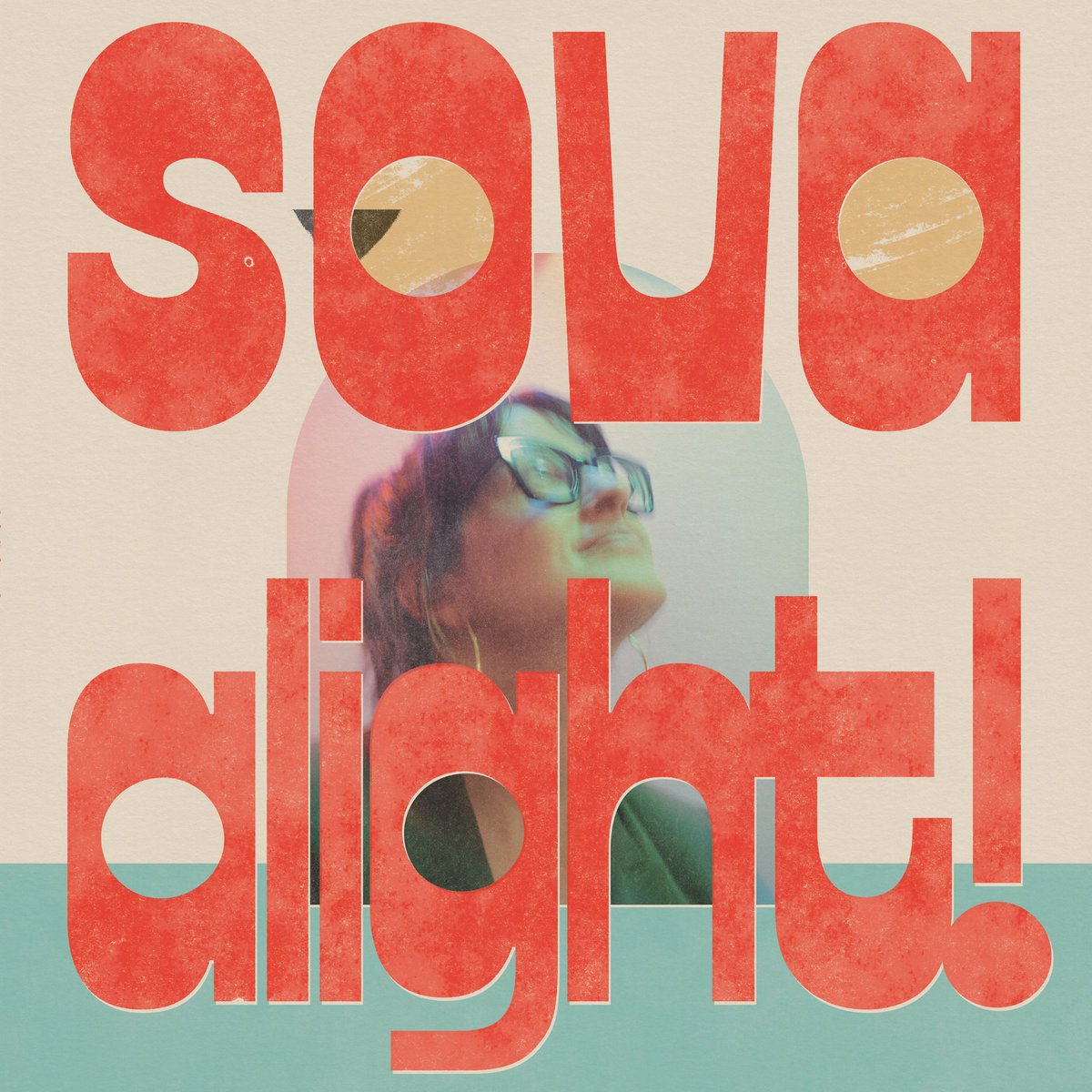 Giant red-orange letters spell sova and alight! on cream and teal around a woman in dark glasses gazing upward inside an arch; yellow circles in two letters read as owl eyes.