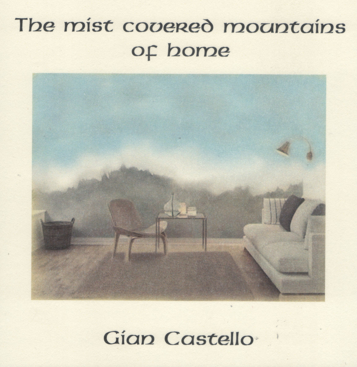 The mist covered mountains of home cover